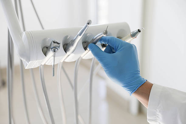 Professional Tooth Extraction technician working in Tinley Park, IL